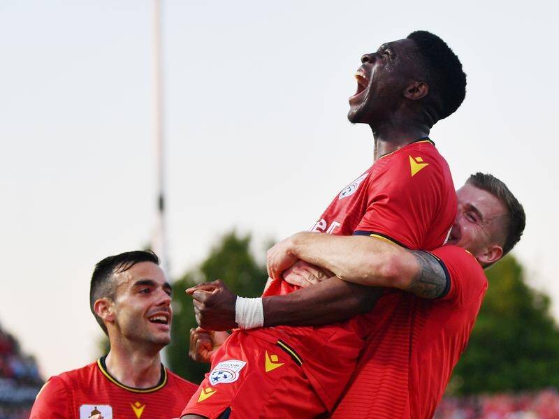 Al Hassan Toure was influential in Adelaide's crushing 4-0 FFA Cup final win over Melbourne City.
