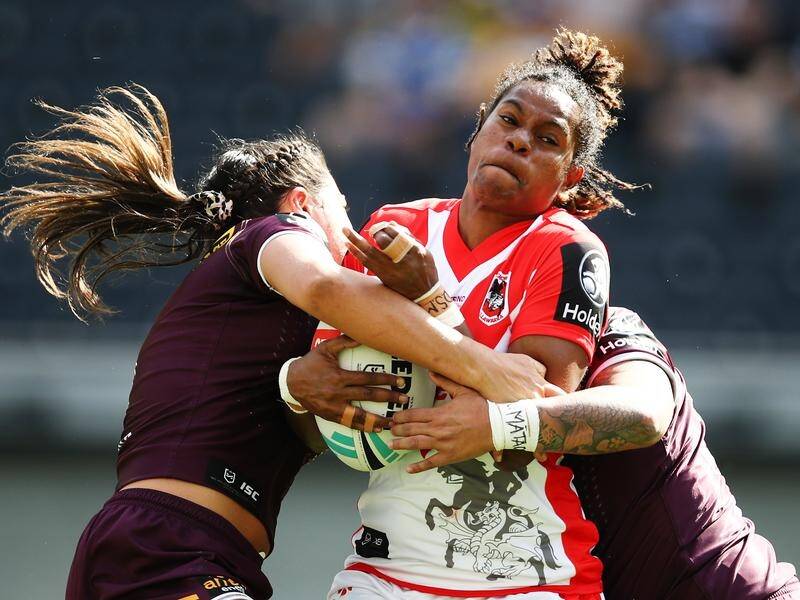 Stephanie Mooka of the Dragons is tackled during the Broncos' 14-4 NRLW win.