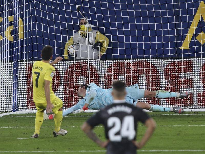 Gerard Moreno slotted home a 75th minute penalty to earn Villarreal a draw with Real Madrid.