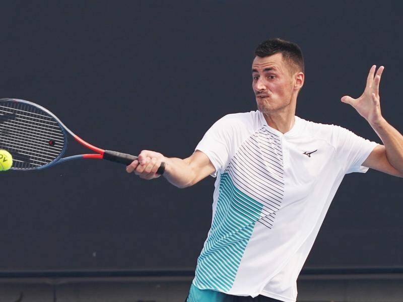 Bernard Tomic says his girlfriend is coaching him and he has a renewed perspective on tennis.