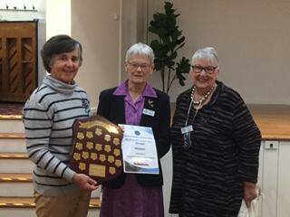 ACKNOWLEDGED: Elizabeth Bassingthwaighte (l) with her award for Publicity, Wallendbeen branch, with Margaret Smith, Bellarwi branch and Tina Billing, Hume Group President (r), Batlow branch.