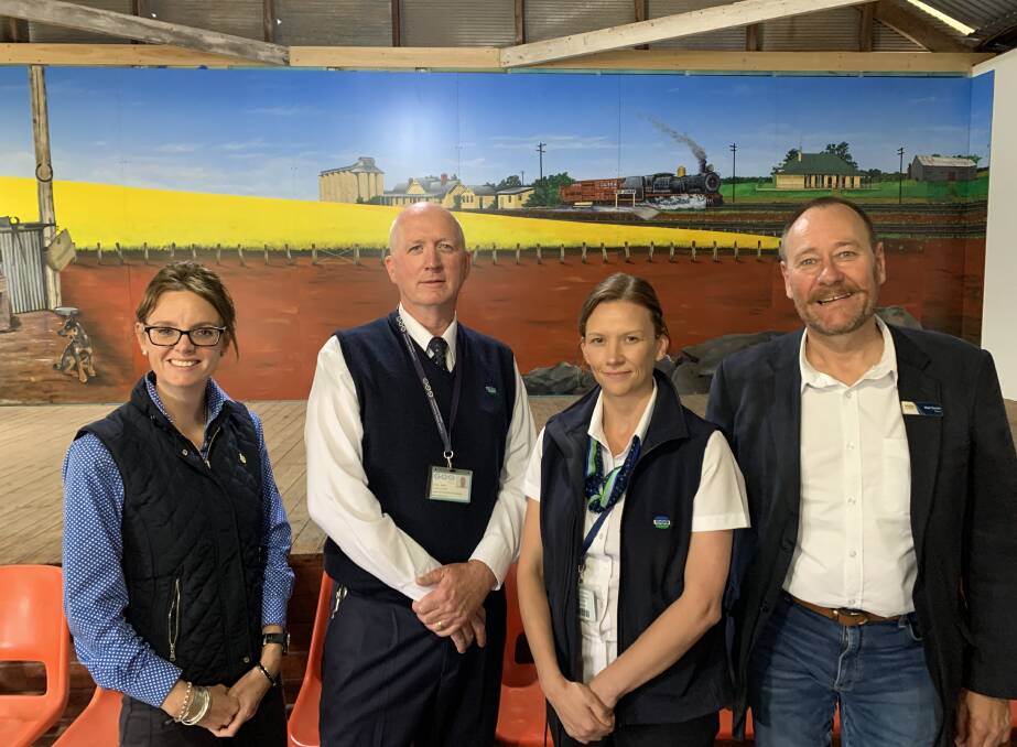 FINISHED PRODUCT: Steph Cooke, Trevor Coles, Ainslie Wood and Neil Smith reveal the completed mural. Picture: Contributed