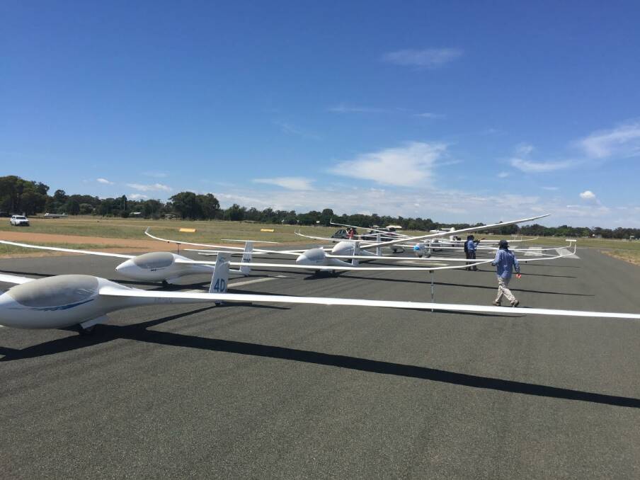 LOOKING UP: A grid of gliders line up ready to be launched behind the tow planes. Picture: Contributed