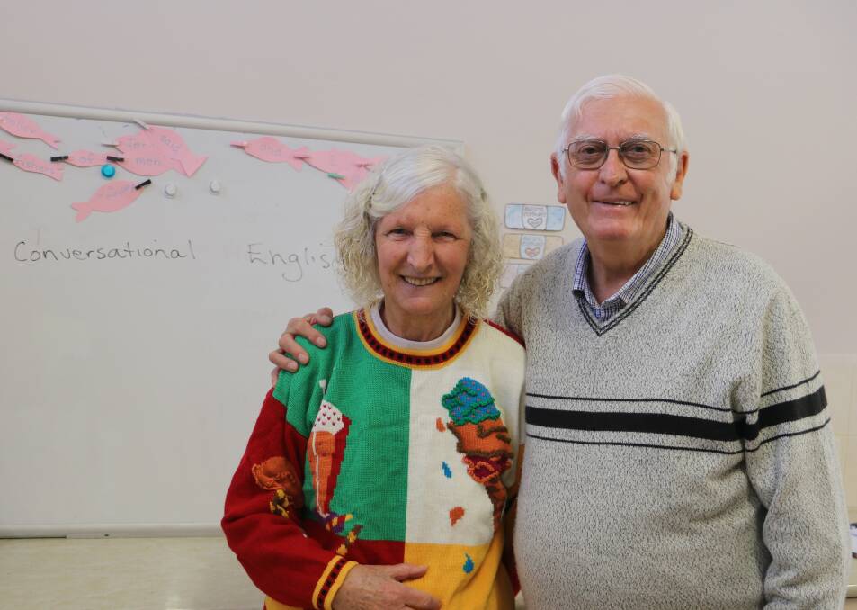 PASSIONATE PAIR: Annette and Chris Turk welcome new people to Junee, keen to help them adjust to the Australian lifestyle. Picture: Jessica McLaughlin