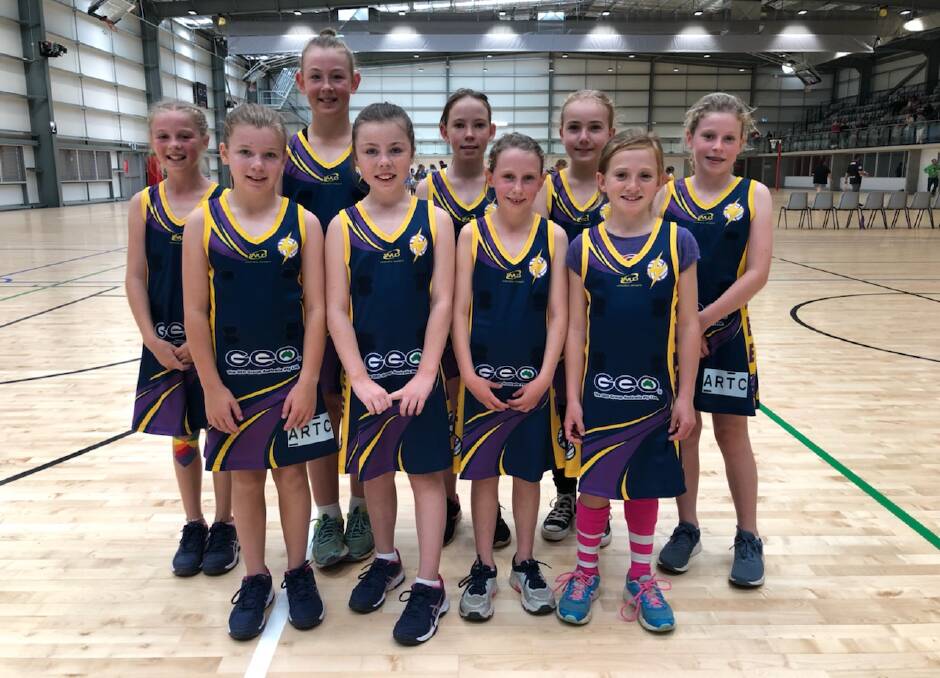 TEAM SPIRIT: The Junee Giants u11 girls are confident they can take the win in this weekend's semi final match at the Equex Centre in Wagga. Picture: Contributed