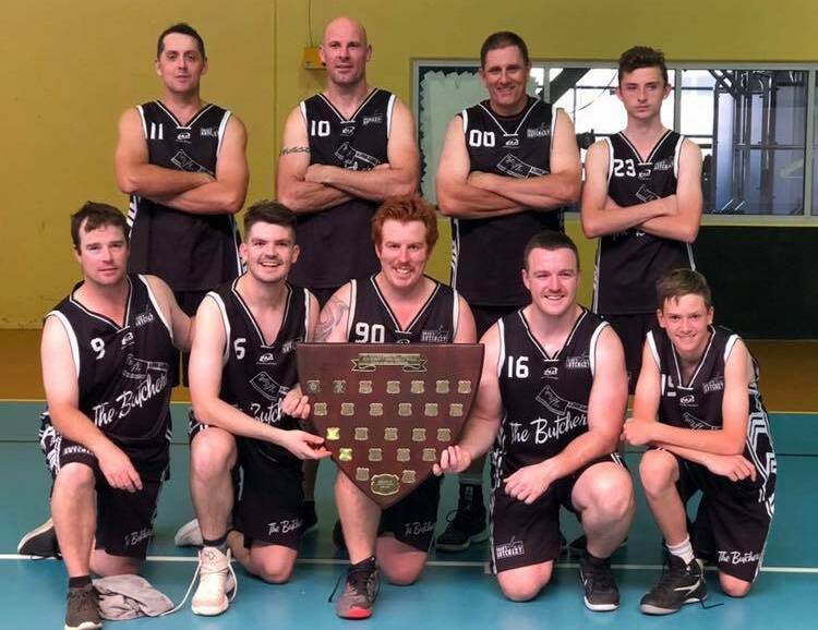 THROWBACK: The Junee Butchers show off their shield from the 2018 finals, with a few members since leaving the team and a few more joining in. Picture: Contributed