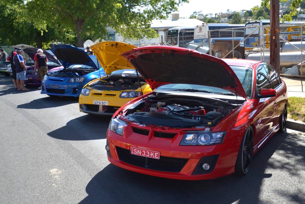 Modern HSVs in among all the history for the Show 'n' Shine at the 2014 Rhythm n Rail festival.