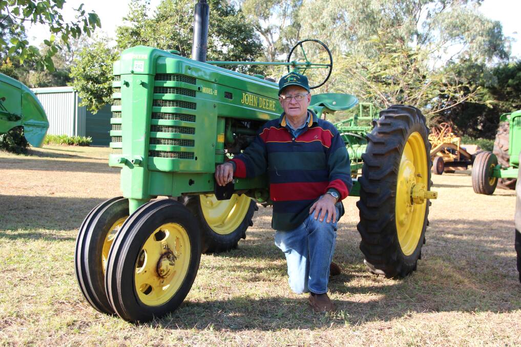 Albert Brimblecombe, Highfields, with one of his favourite restorations, the John Deere Model-H. He will sell his entire tractor collection later this month. Pictures: Melody Labinsky 