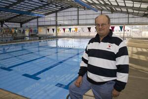 STRONG SWIMMER: Roger Dietrich has continued his push to swim one million metres, and has also broken records at the Tuggeranong Masters Swimming Club. Picture: Declan Rurenga