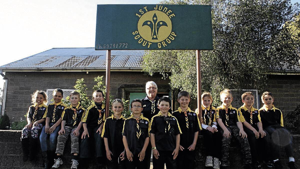 WE LOVE AKELA: 1st Junee Cub Scouts leader Jackie Starr has celebrated 25 years with the organisation this week. It might have been a big milestone for Mrs Starr, but it is too for her Cub Scouts, including (in no particular order) Bayley Guinan, Duncan Muir, Samual Gallop, Peter Guymer, Benjamin Gallop, Harry Guymer, Lachlan Muir, Sarah Oriel, Luke Hart, Natasha Lamb, Digby Makeham and Toostie Lamb, who get to celebrate with her. They know her as “Akela”. Picture: Kree Nash